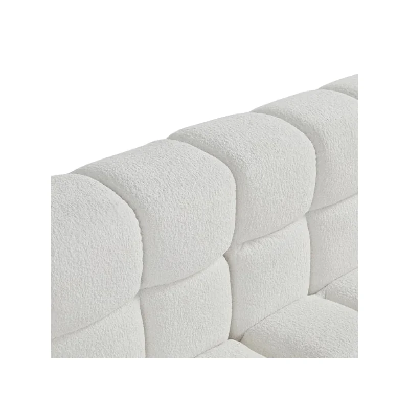The soft curly texture of the white fabric, up close