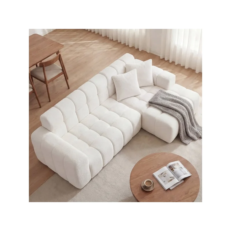 The white corner sofa seen from above in a room, chaise longue on the right
